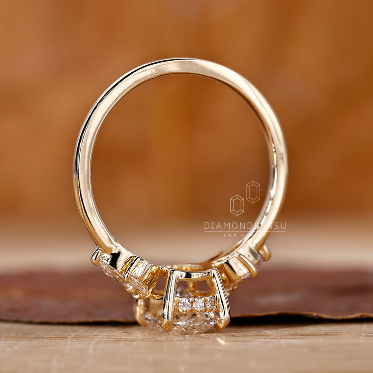 Yellow Gold Ring featuring an oval diamond in a timeless setting.
