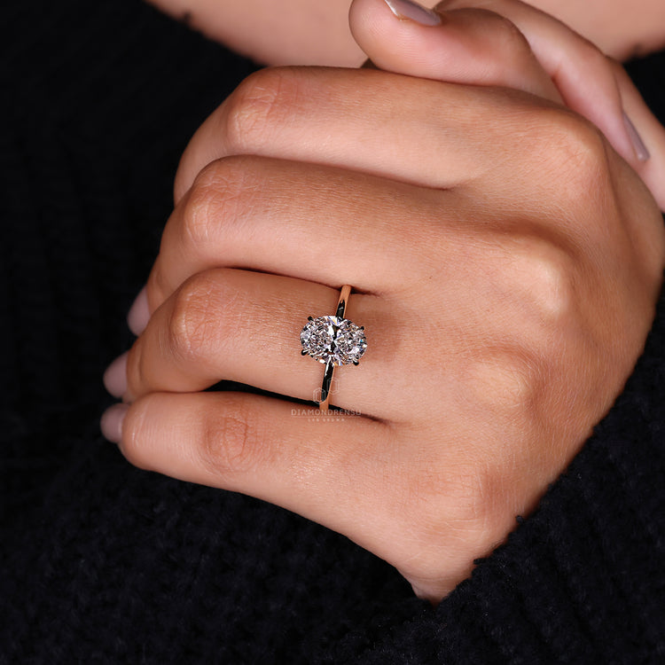 Oval Diamond Ring set in a unique and elegant style.