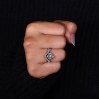 Curved Wedding Band perfectly paired with a marquise diamond.
