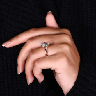 Oval solitaire ring featuring a stunning diamond centerpiece.
