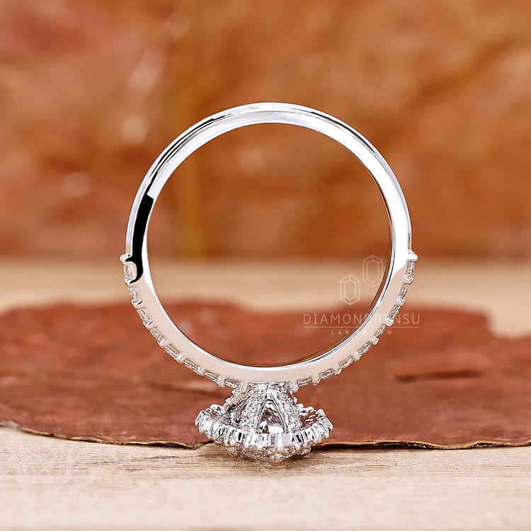 Prong Setting featuring a secure placement for a pear-shaped diamond.