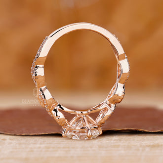 Nature inspired ring with a twisted pave setting for modern elegance.

