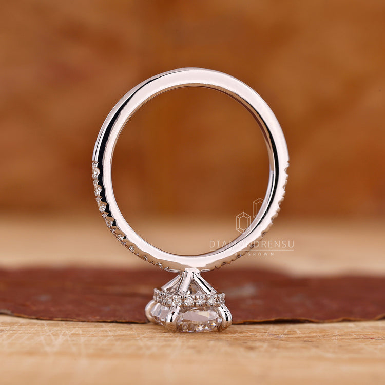 Round Cut Diamond Ring with stunning white gold accents.