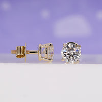 Beautiful round cut diamond earrings showcasing unmatched brilliance.
