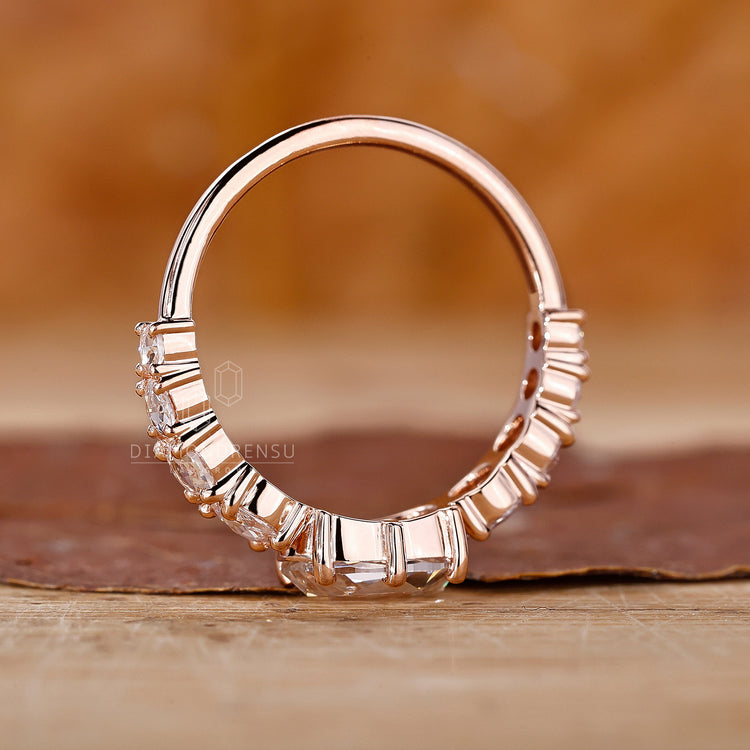 Prong Setting Ring designed to securely hold each diamond.