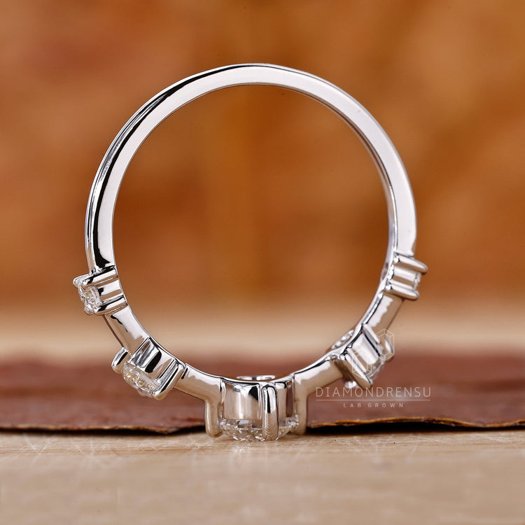 Handmade Jewelry featuring a luxurious 5 stone engagement ring.