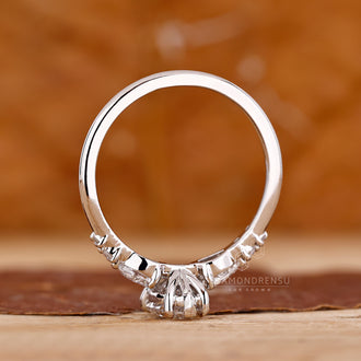 Lab grown pear diamond ring in white gold.
