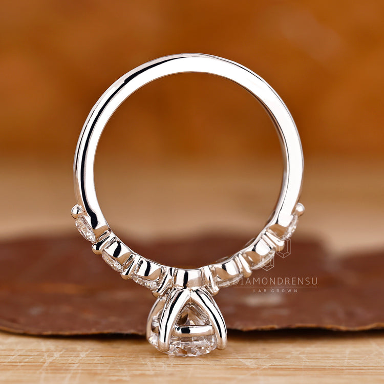 Custom handmade engagement ring with lab grown diamonds and IGI certification.
