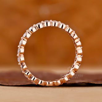 Rose gold milgrain diamond wedding band.
