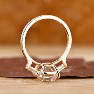 Diamondrensu engagement ring featuring a cushion cut diamond, set in a secure basket setting.