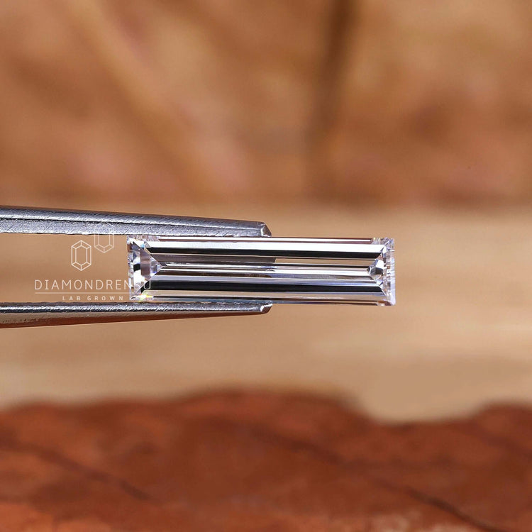Loose lab grown diamond in long baguette cut style.