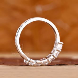 Handmade band paired with white gold wedding band.
