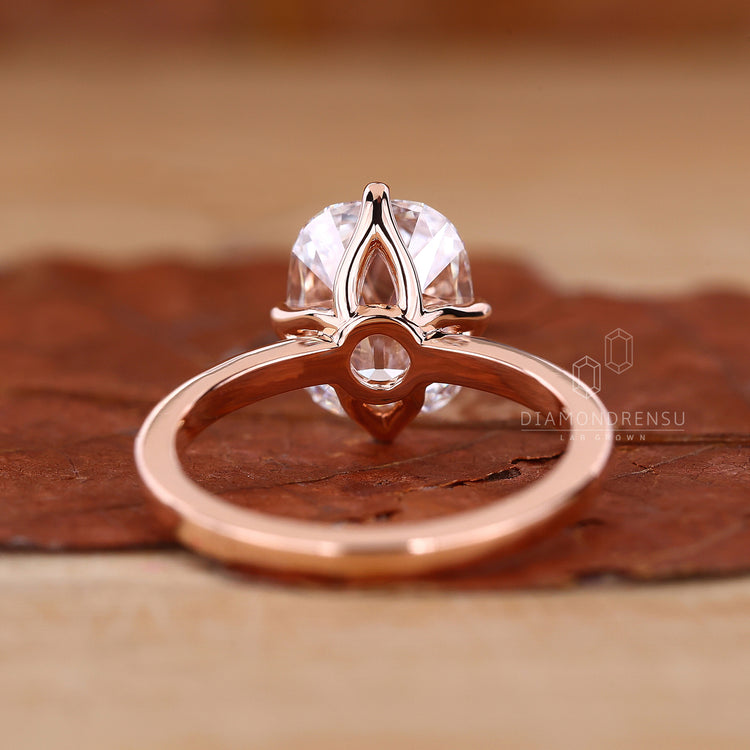 Solitaire Engagement Ring with a brilliant diamond centerpiece.
