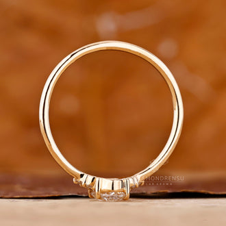 IGI certified handmade ring with oval diamond and round side stones.
