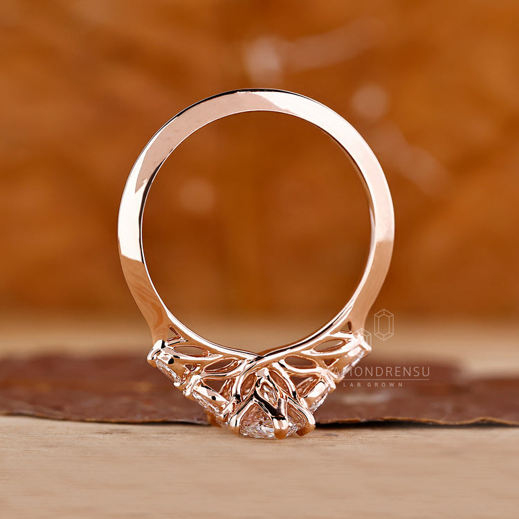Diamondrensu handmade marquise shaped diamond ring in muse setting.
