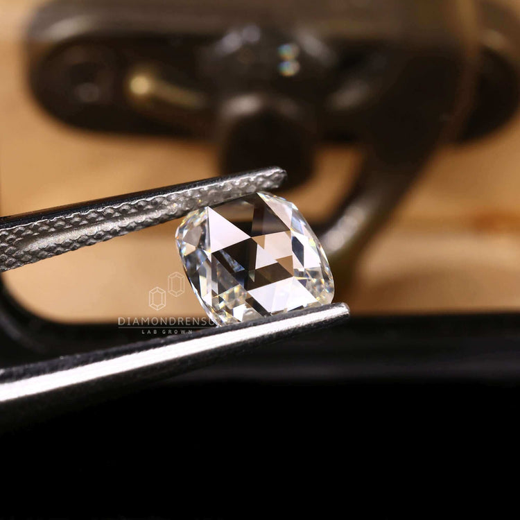 This loose diamond is a lab grown stone with an antique rose cut cushion.
