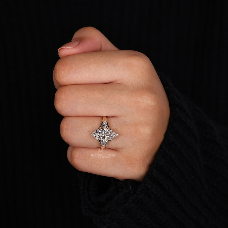 3 Stone Marquise Diamond Ring in a stunning setting.