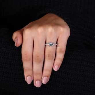 Custom ring with princess cut stone and handmade jewelry style.
