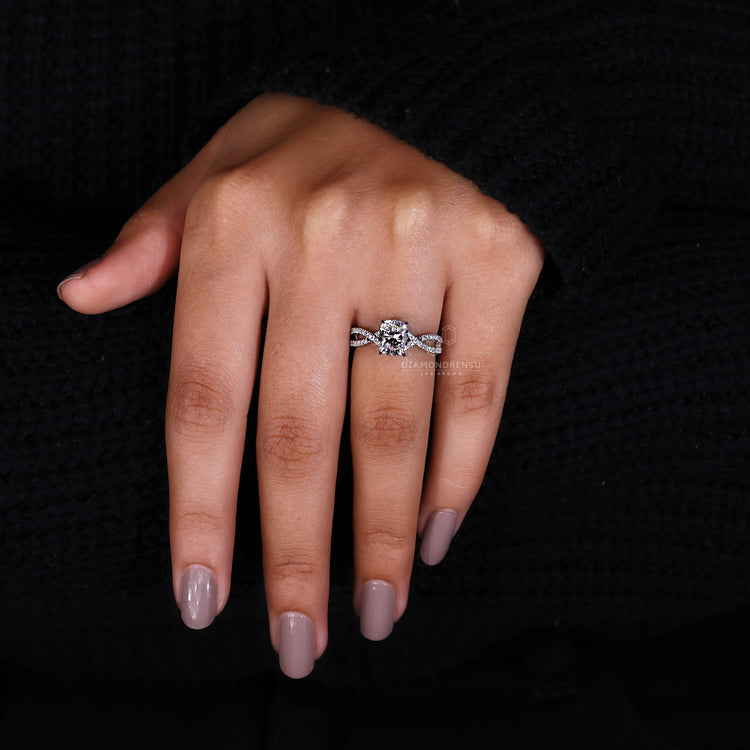 Claw Prongs securely holding a stunning center diamond.