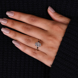 Oval Ring with Hidden Halo for a subtle yet dazzling effect.