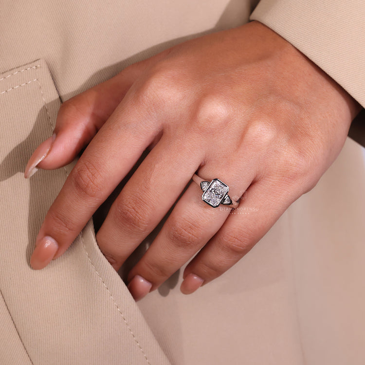 Engagement Ring with Trillion Side Stones for added beauty.