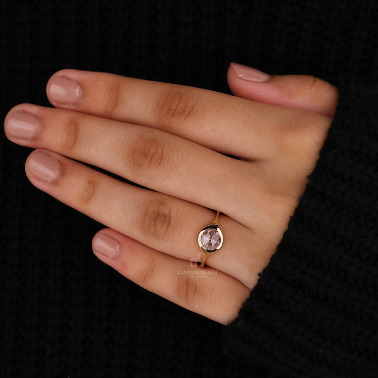 Handmade ring featuring a round rose cut diamond for added elegance.
