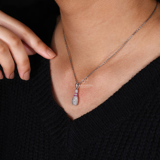 Men's Bowling Pin charm pendant with prong set and diamond accents.
