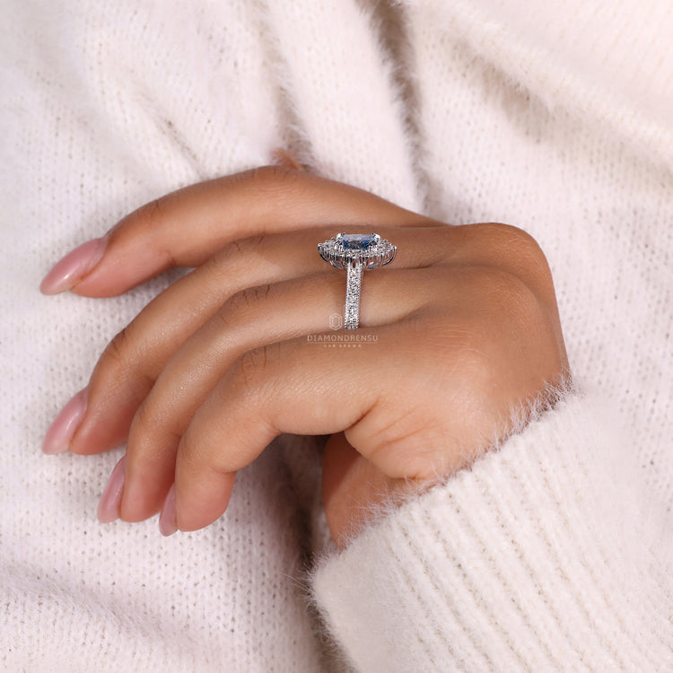 Milgrain in shank of vintage halo engagement ring
