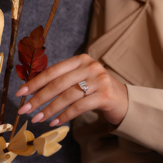 Two stone engagement ring with claw prong setting.
