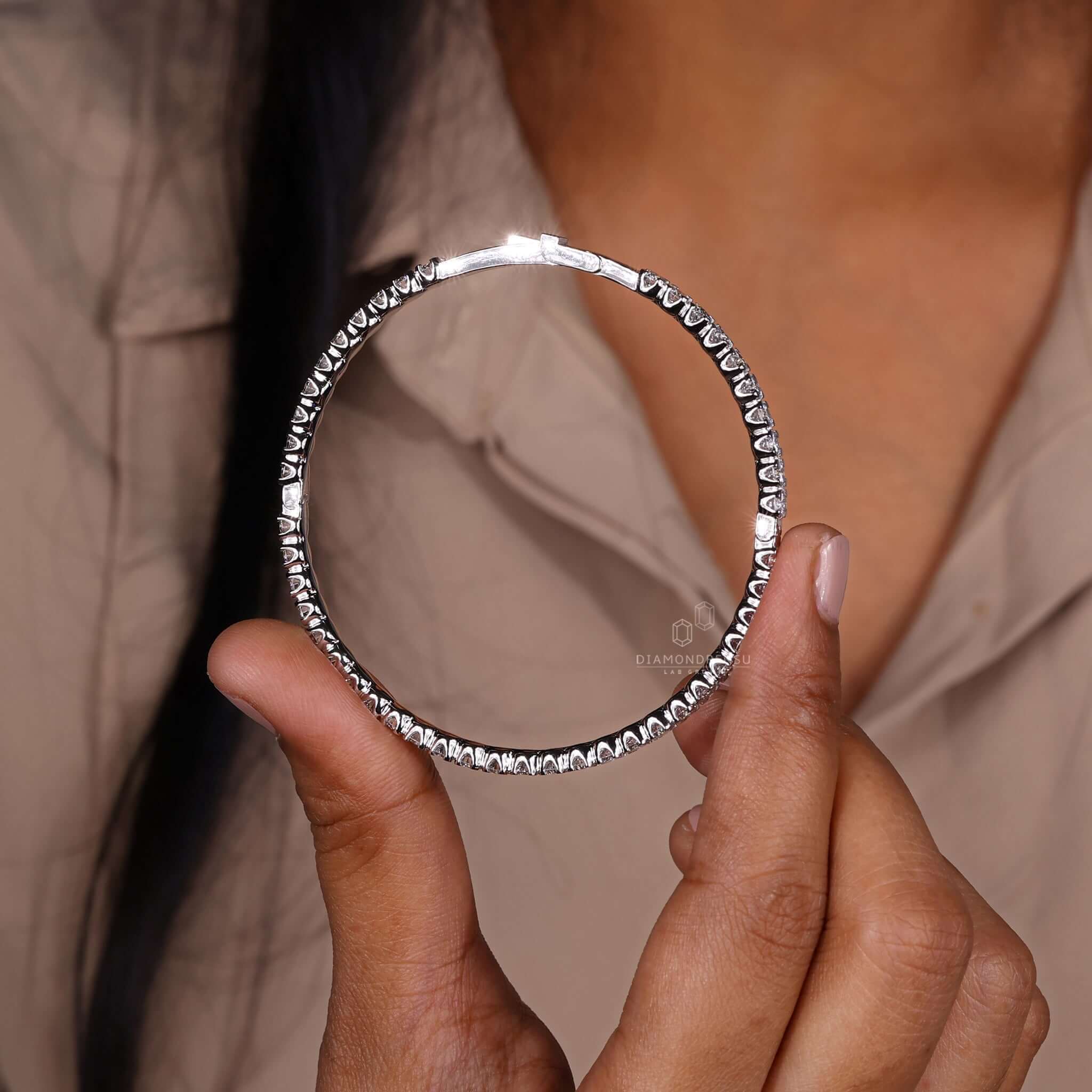 Elegant gold bangle bracelet on a white background