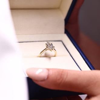 Solitaire engagement ring with v prong setting.
