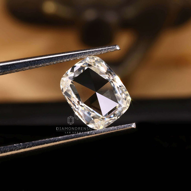 Buy lab grown loose diamonds with an antique elongated rose cut cushion.
