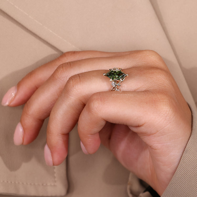 Round and marquise side stone yellow gold ring.
