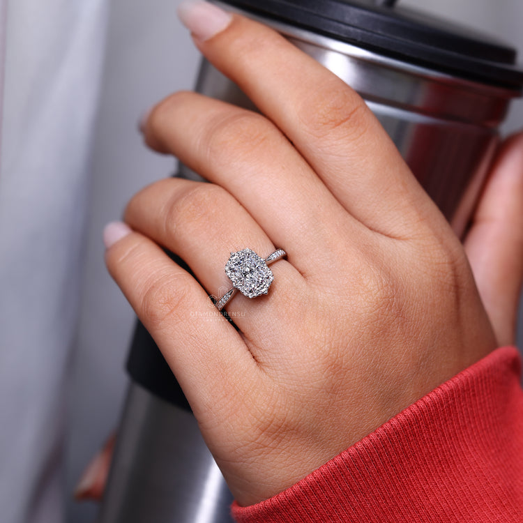Lab grown diamond engagement ring with four claw prong setting.
