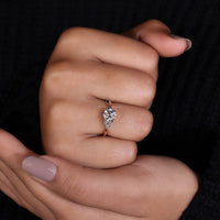 A stunning round cut diamond ring featuring exceptional brilliance.
