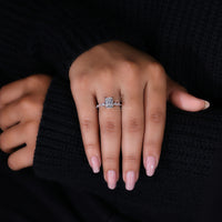 Double Hidden Halo Engagement Ring with sparkling side stones.