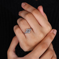 Marquise engagement ring with side stone tapered baguette
