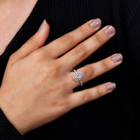 Pear Diamond Ring set in a classic and secure prong setting.