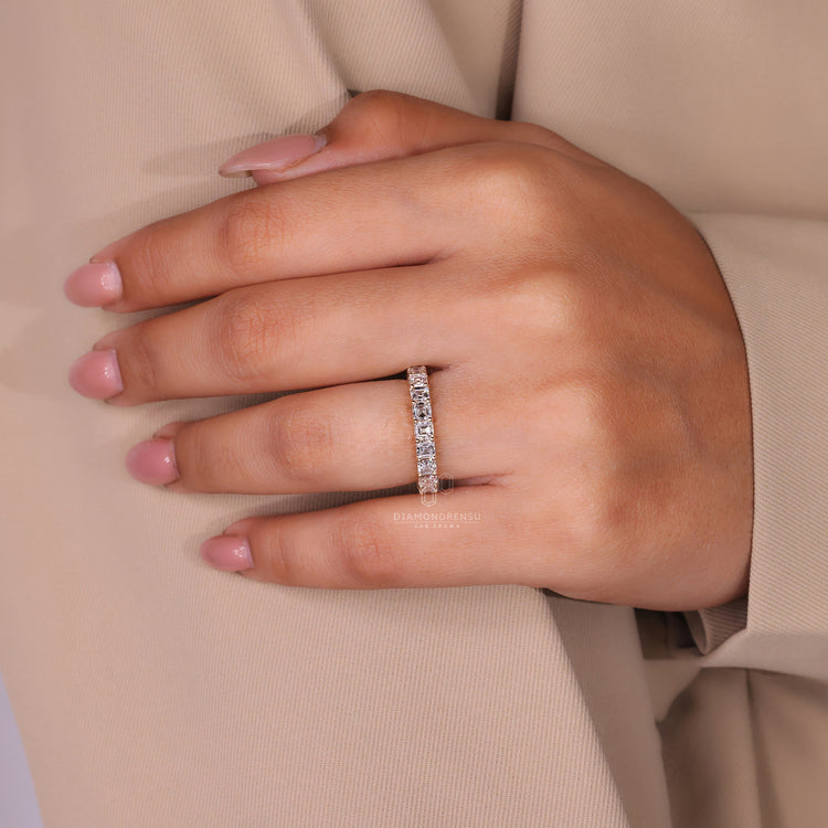 Simple Asscher cut wedding band in gold.