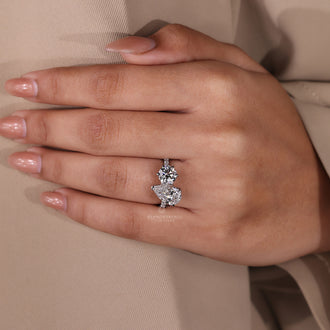 Diamondrensu engagement ring featuring white gold ring with round diamonds.