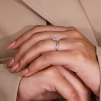 Solitaire Ring with a captivating pear-shaped diamond centerpiece.
