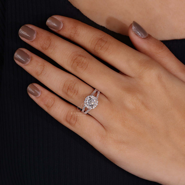 Woman's hand gracefully showcasing the vintage rose gold engagement ring