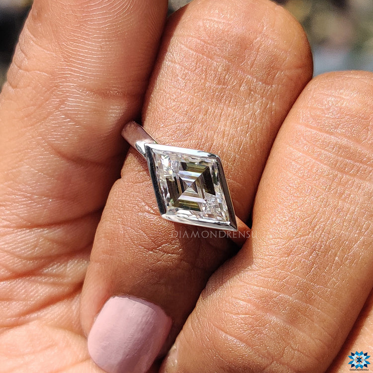 Bezel moissanite ring with a modern handmade design.
