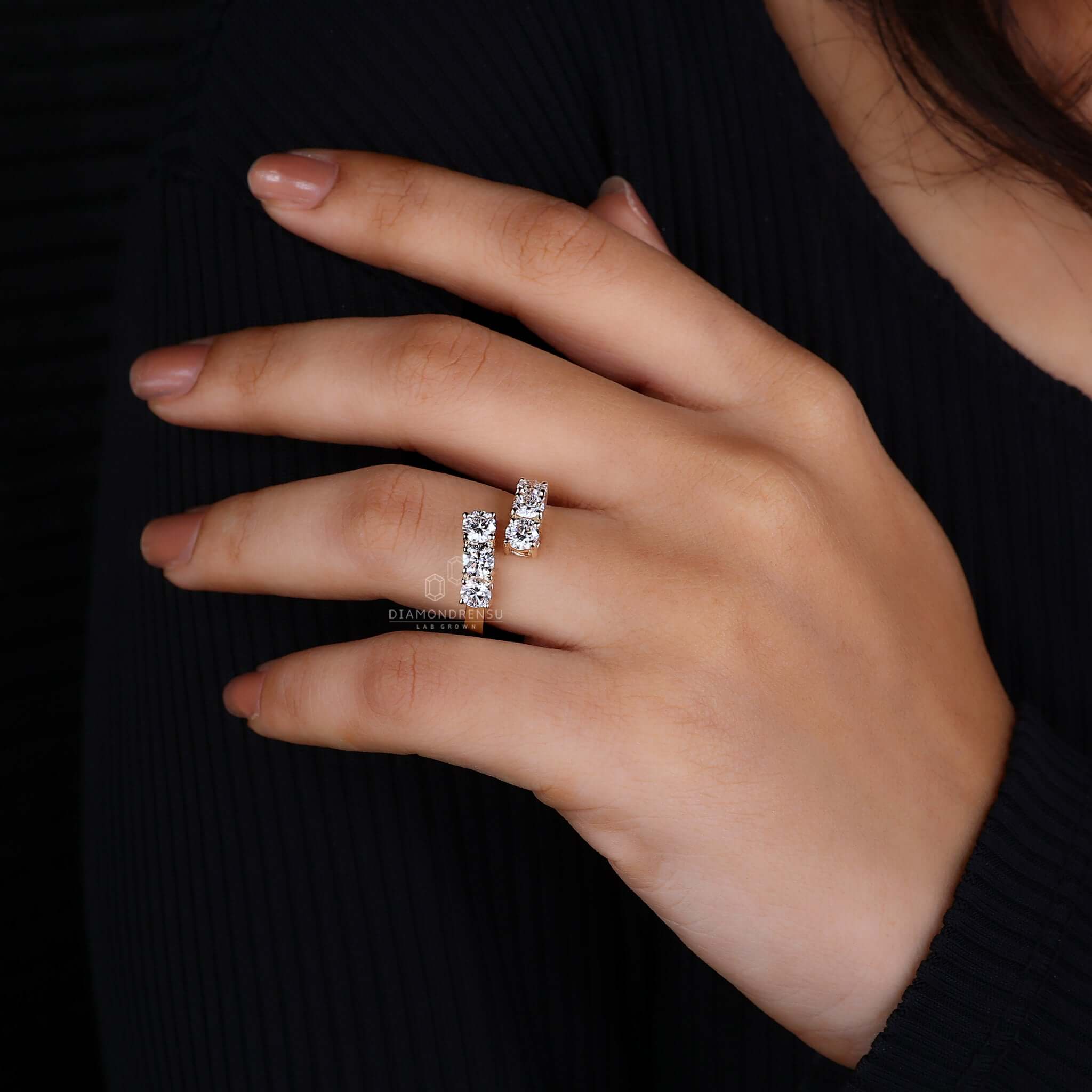 Sophisticated round cut diamond engagement ring on a velvet cushion, exuding luxury and romance.