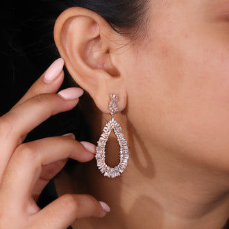 Baguette and round diamond cluster drop earrings in rose gold
