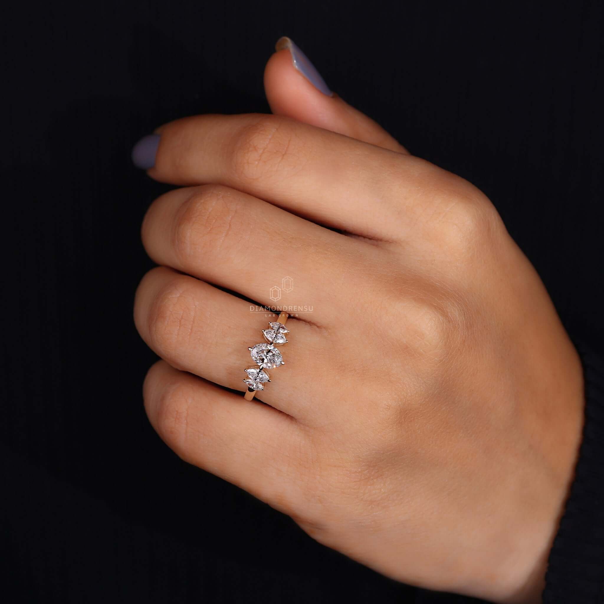 Chic oval ring with diamonds, exuding a modern yet timeless appeal in gold setting