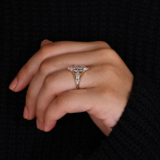 Pear Diamond Ring set with beautiful marquise center stone.