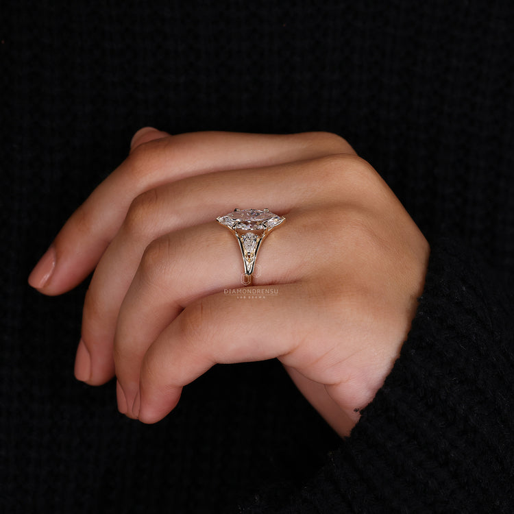 Pear Diamond Ring set with beautiful marquise center stone.