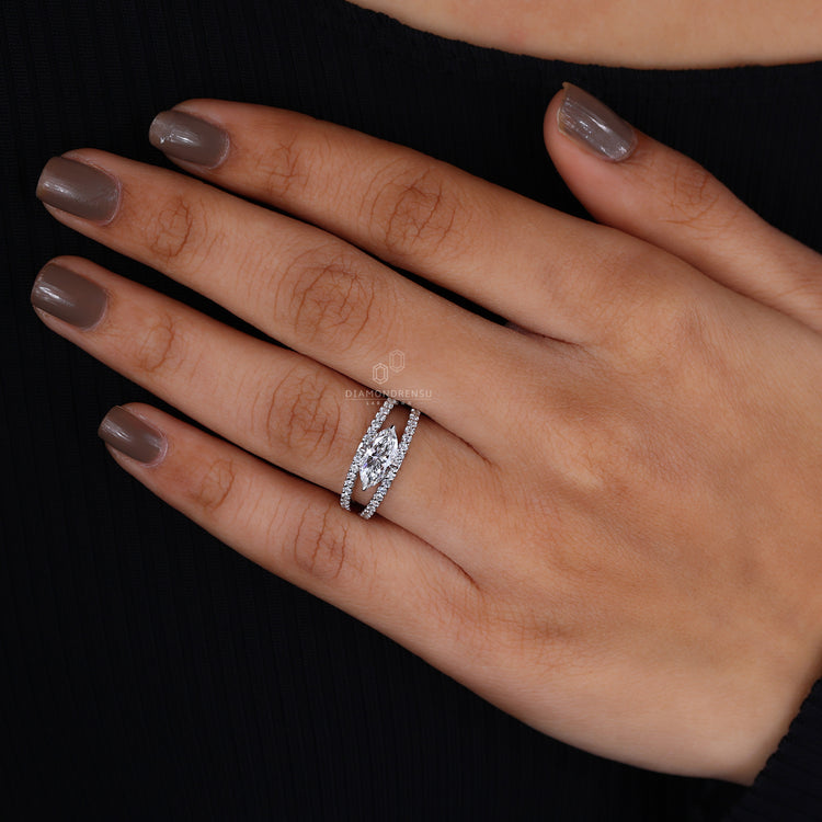 East west engagement ring capturing contemporary elegance.
