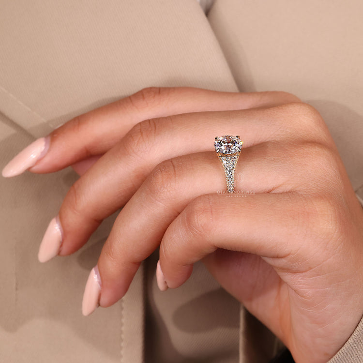 Yellow gold engagement ring with vintage details.
